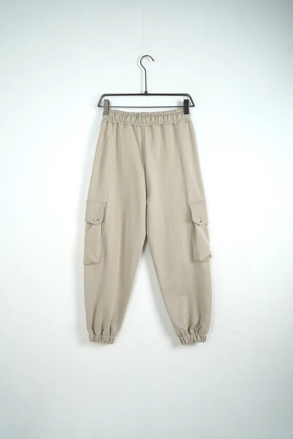 Tuta garzata over fondo stretto beige