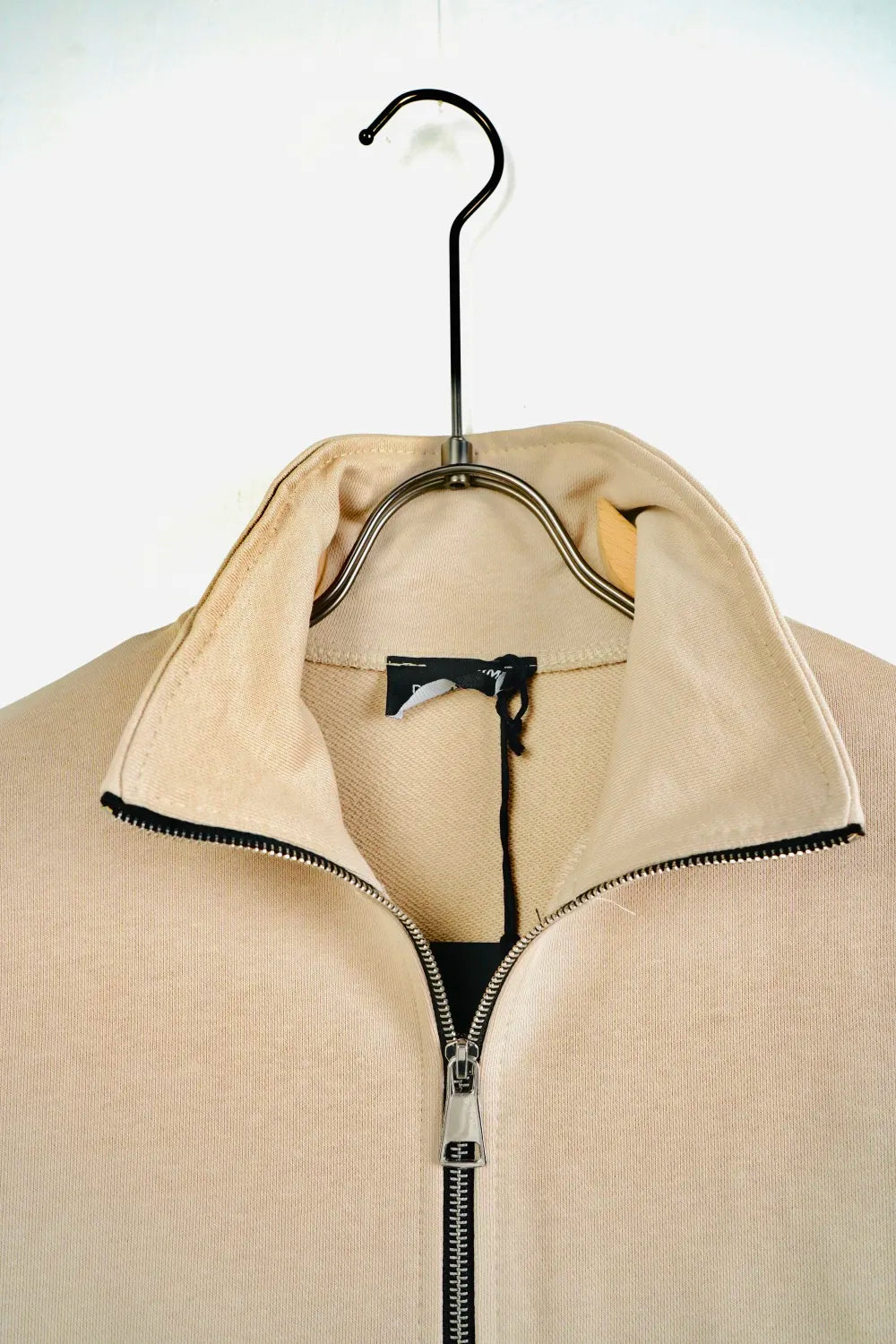 Tuta garzata over fondo stretto beige