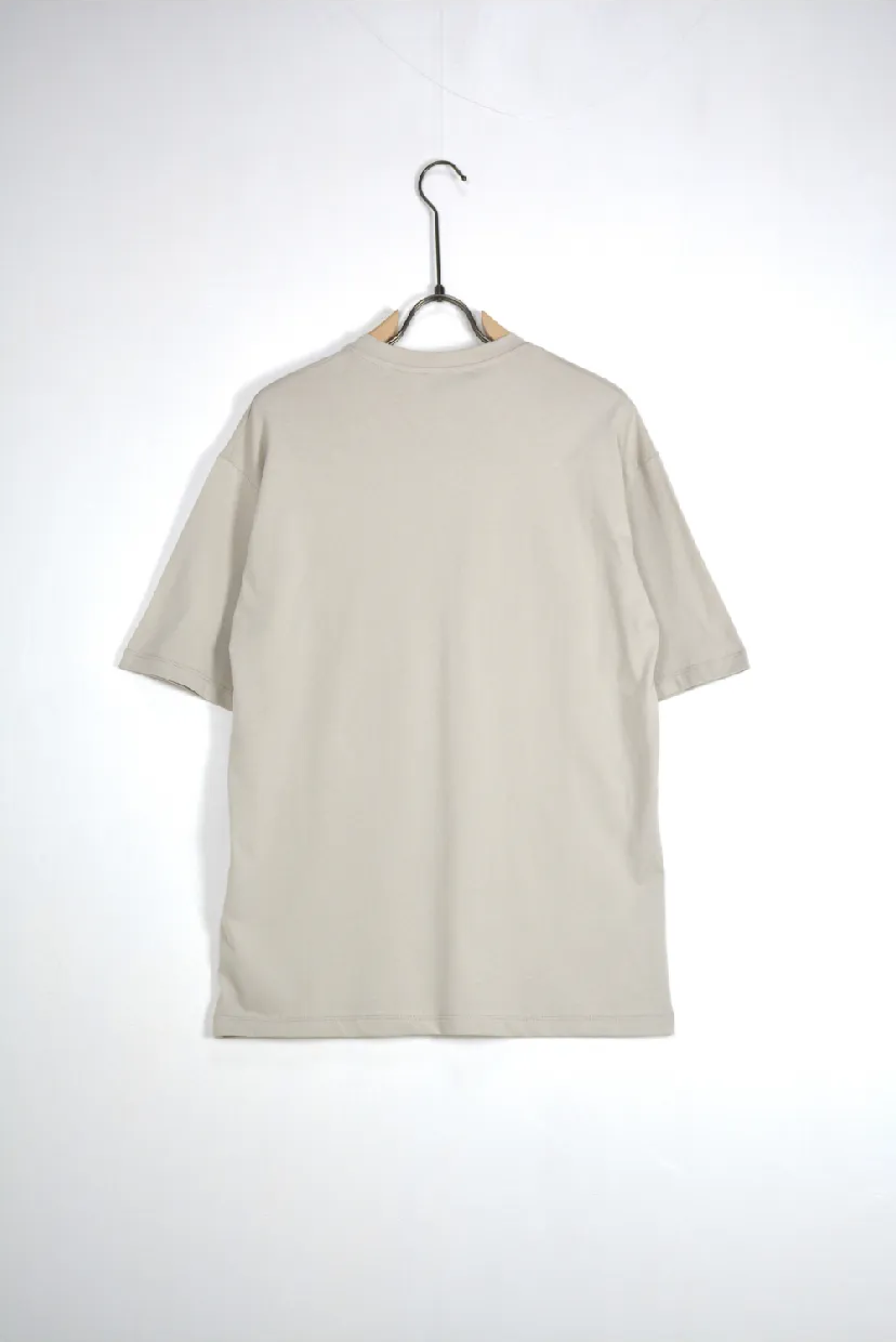 T-shirt over beige