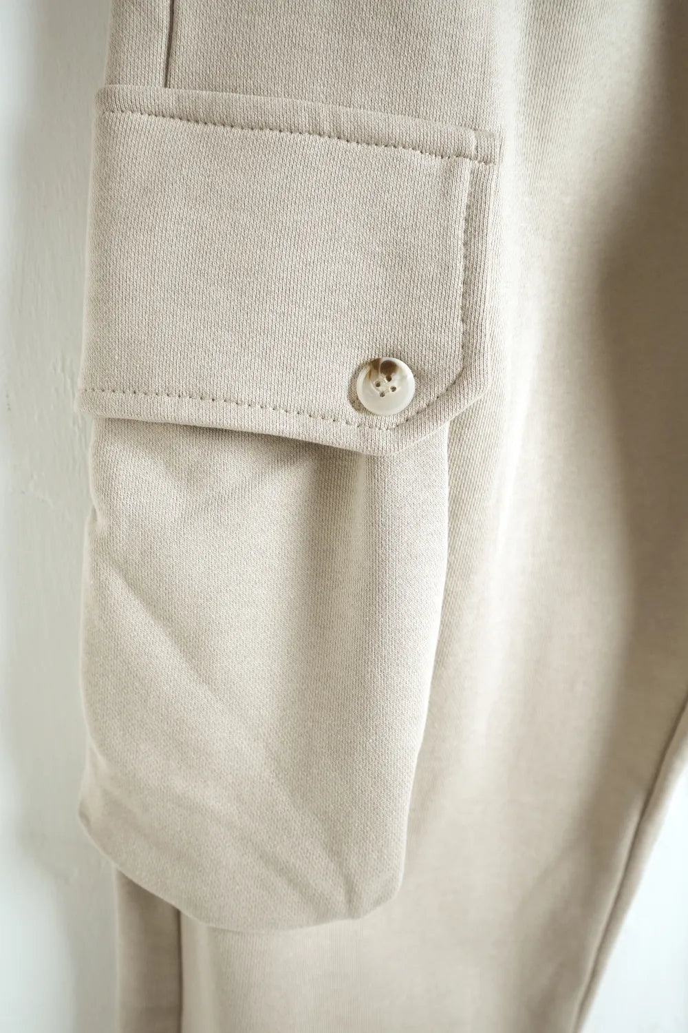 Tuta garzata over fondo stretto beige