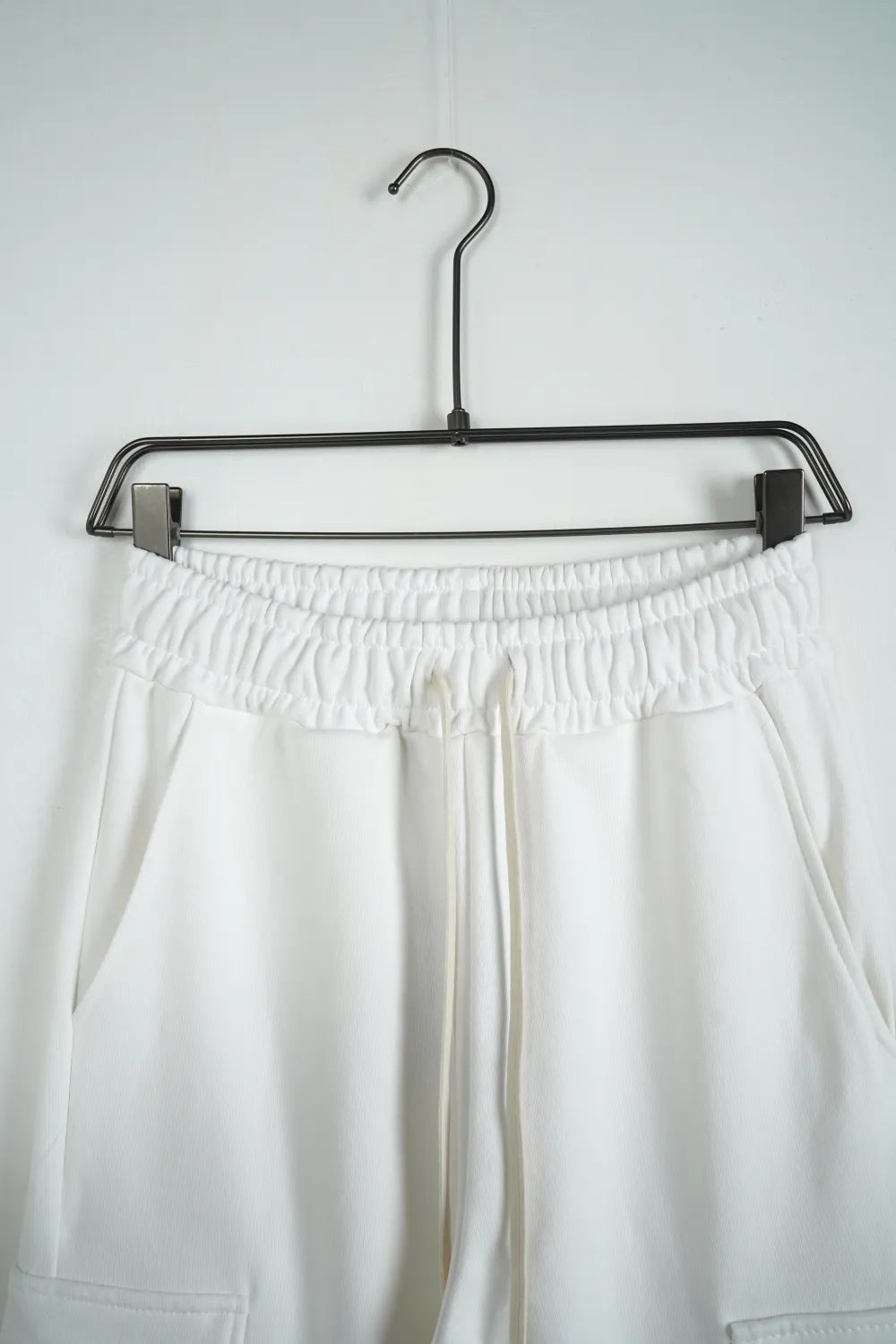 Tuta garzata over fondo stretto bianco