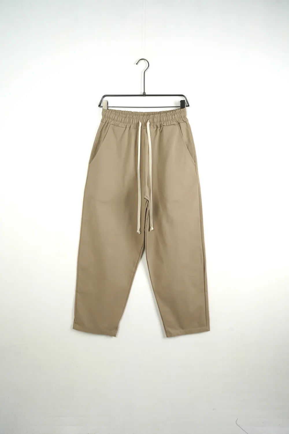 Pantalone fondo largo beige
