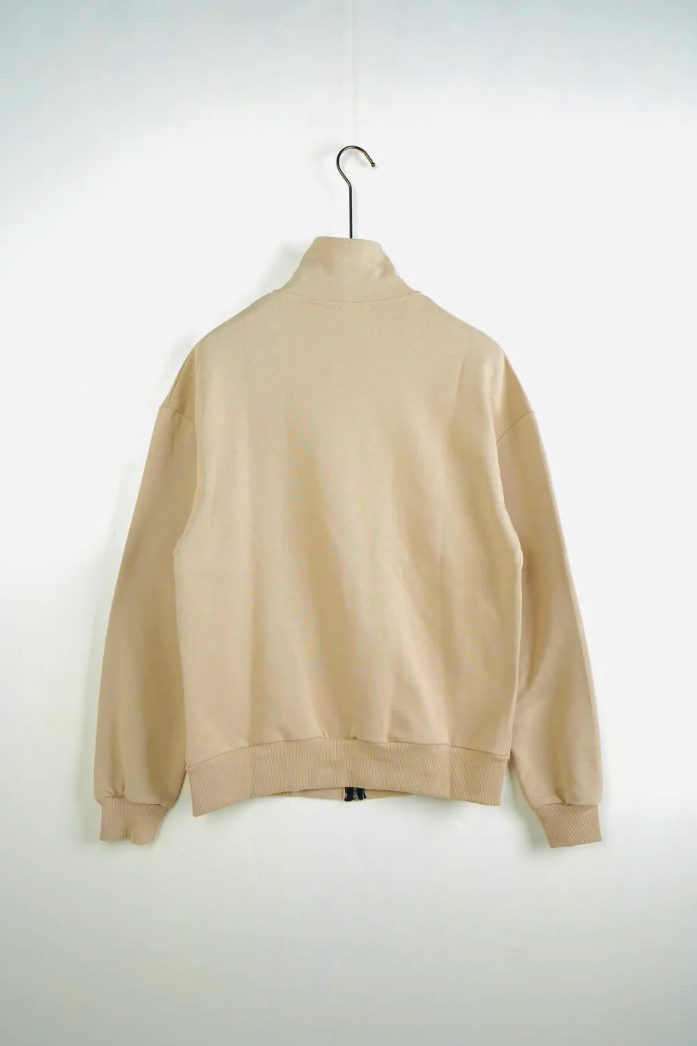 Tuta garzata over fondo stretto beige