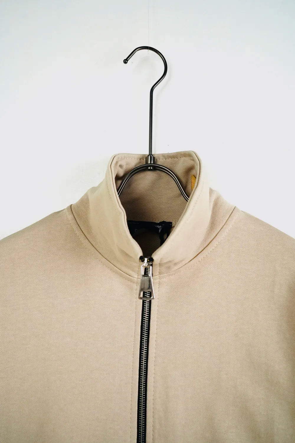 Tuta garzata over fondo stretto beige