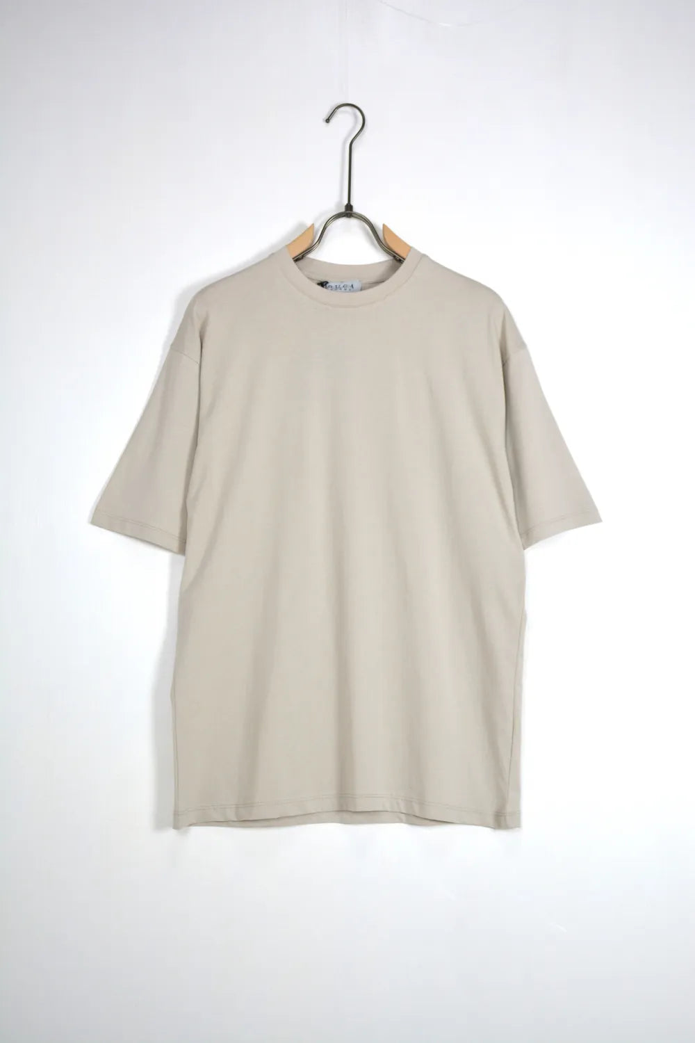 T-shirt over beige